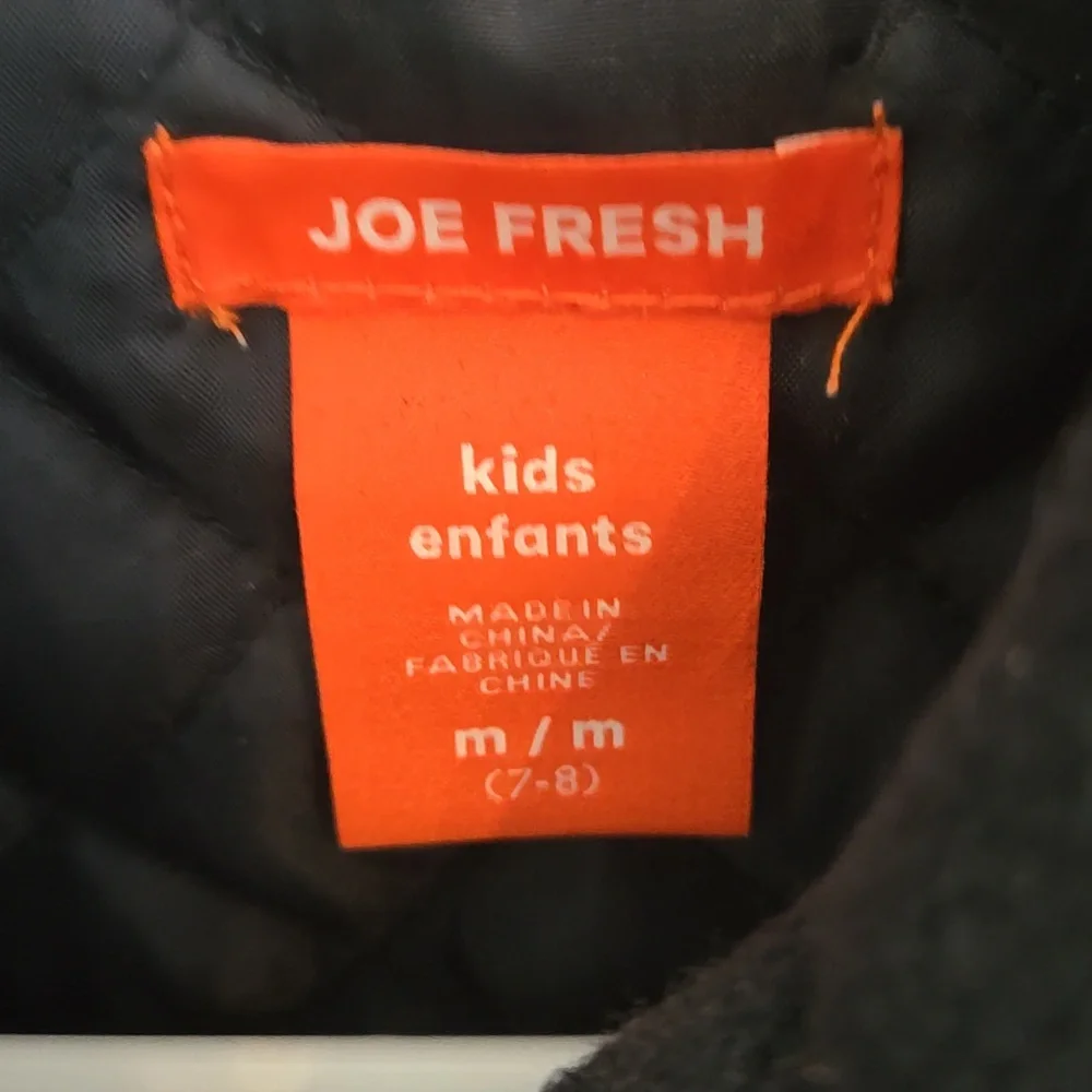 Kids black jacket size 7-8